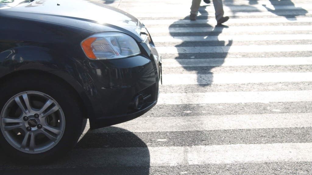 Car in crosswalk