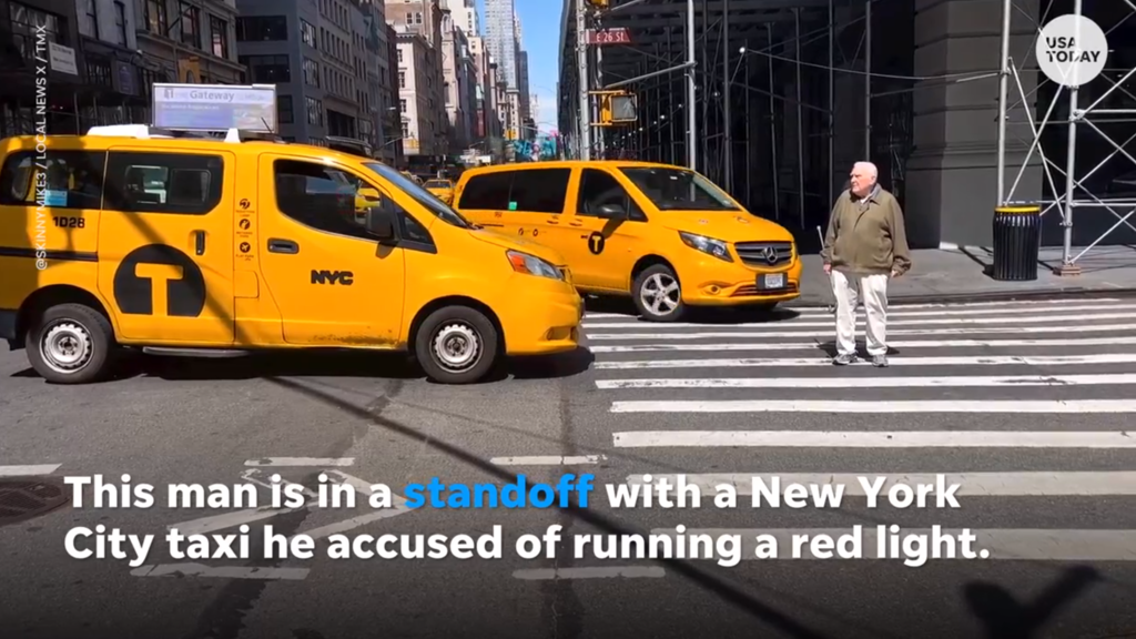Taxi fails to yield to pedestrian in crosswalk