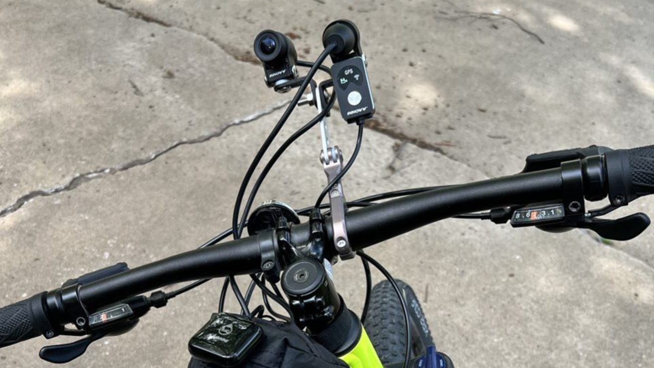 A GPS-enabled camera system mounted to a bike